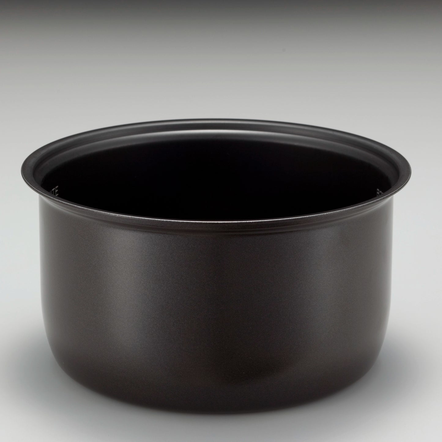 Black thick inner cooking pan and heating system provide even heating for perfectly cooked rice