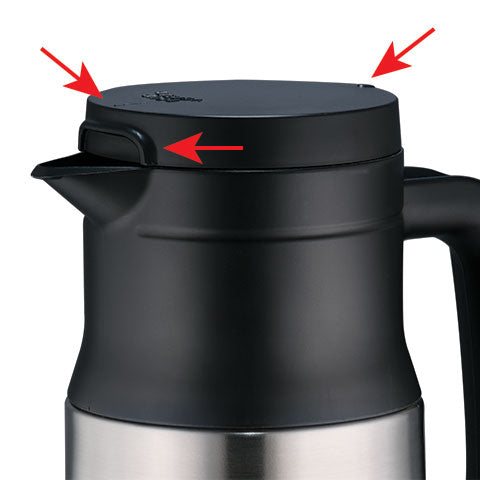Markers on the lid to indicate that creamer is open